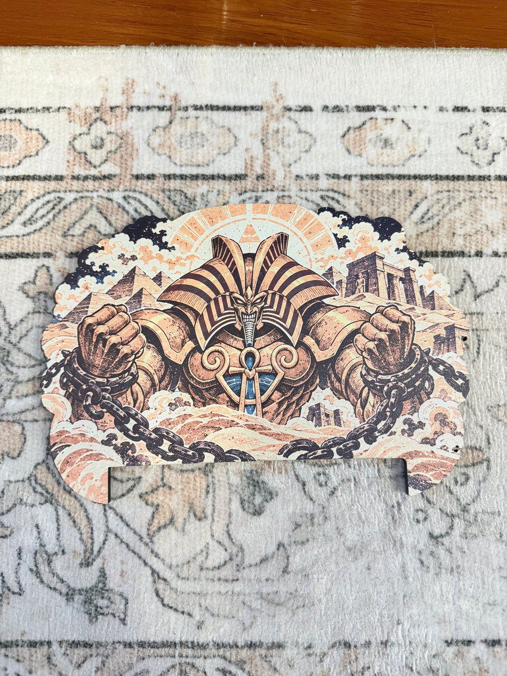 The Forbidden One oversized Steam Machine faceplate flat lay showing a chained pharaoh monster rising from desert sand