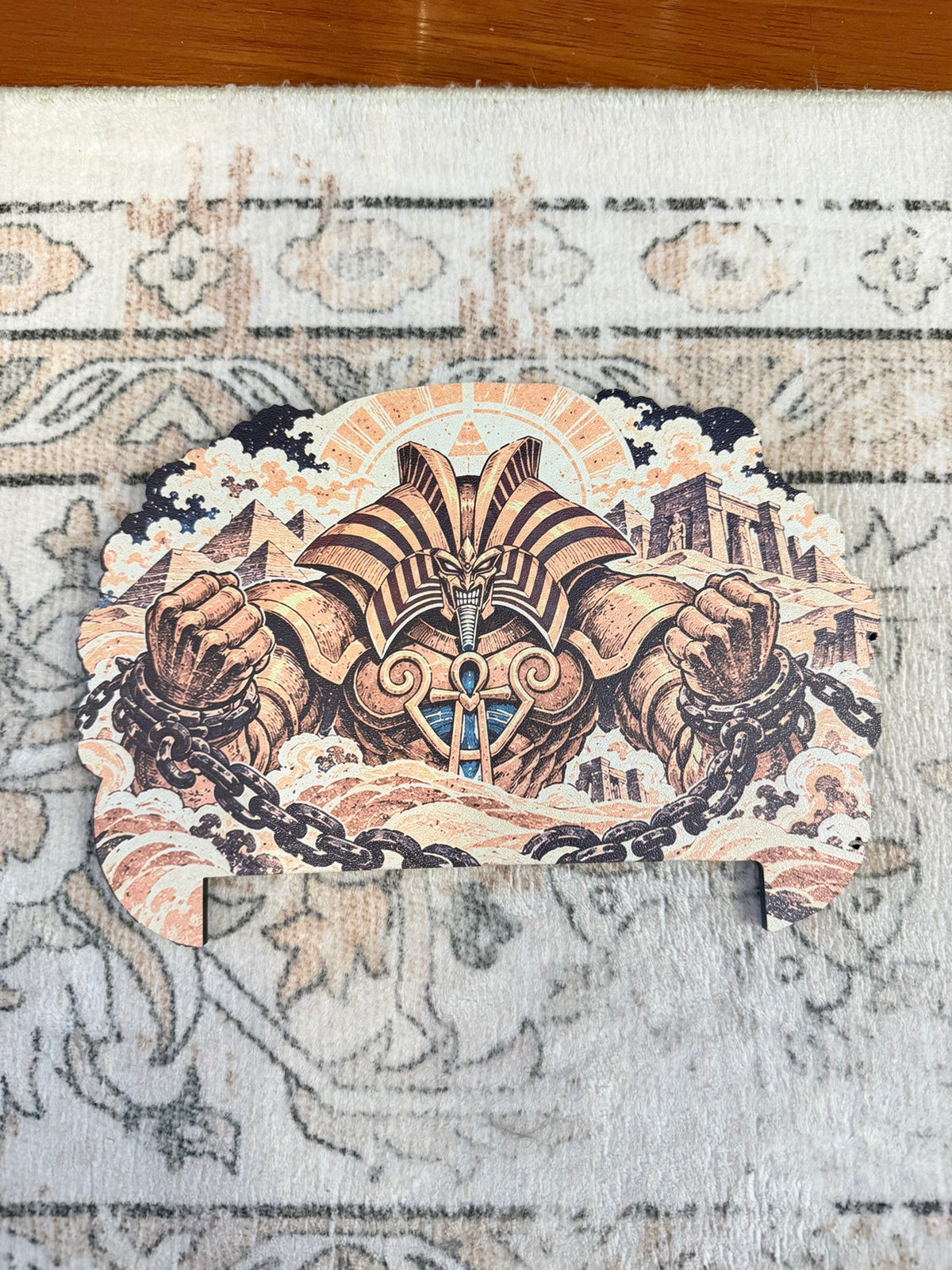 The Forbidden One oversized Steam Machine faceplate flat lay showing a chained pharaoh monster rising from desert sand