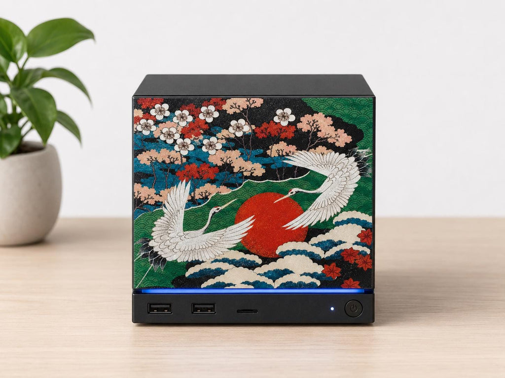 Japanese Crane Steam Machine Faceplate – UV Printed Front Panel | Red Sun & Cherry Blossom Art | Custom Mini PC Cover | Gamer Gift, front view of the crane faceplate installed on the console on a light wooden surface, with a potted plant in the background