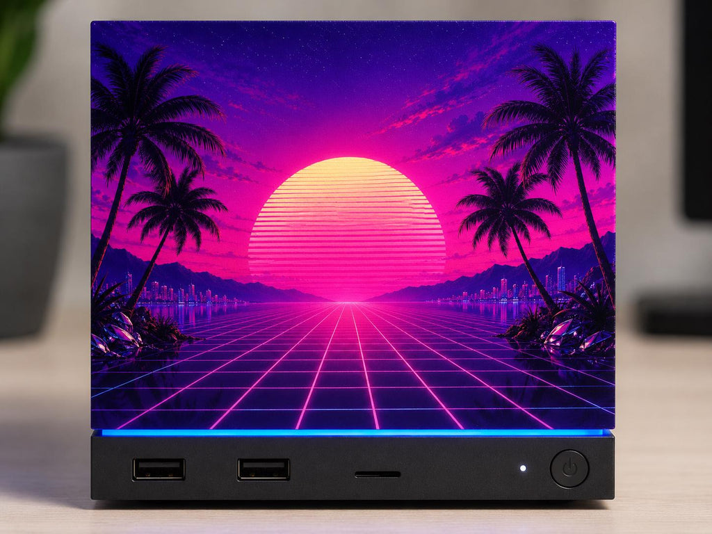 Synthwave Steam Machine Faceplate UV Printed Front Panel | Retro Neon Sunset Grid Art | Custom Mini PC Cover | Gamer Gift, close-up front view of the Steam Machine with the synthwave faceplate, showing the full neon sunset, palm trees and grid artwork on a light wooden desk