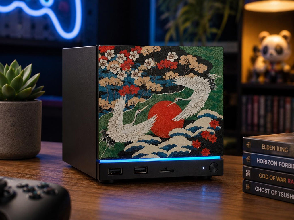 Japanese Crane Steam Machine Faceplate – UV Printed Front Panel | Red Sun & Cherry Blossom Art | Custom Mini PC Cover | Gamer Gift, front view of the crane faceplate installed on the console on a wooden desk, with a stack of video game books, a potted succulent, and a neon sign nearby