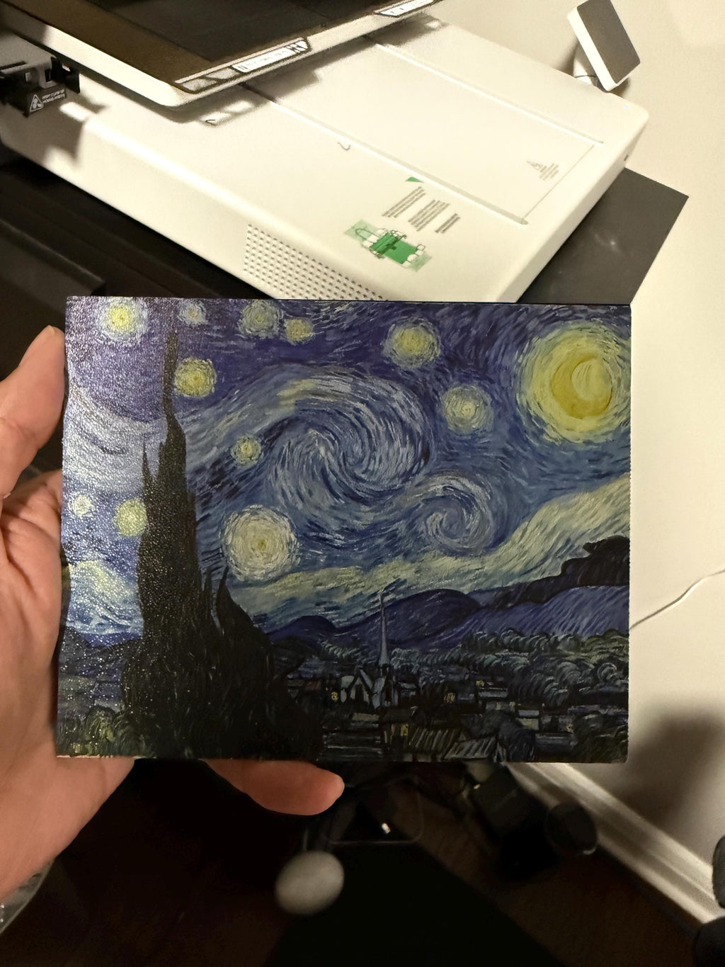 Starry Night Steam Machine Faceplate: Van Gogh Art UV Printed Magnetic Panel, hand holding the uninstalled Starry Night faceplate panel in front of a UV printer