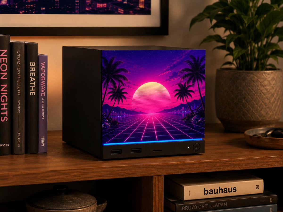 Synthwave Steam Machine Faceplate UV Printed Front Panel | Retro Neon Sunset Grid Art | Custom Mini PC Cover | Gamer Gift, Steam Machine with the synthwave faceplate installed on a wooden shelf beside retro books and a potted plant
