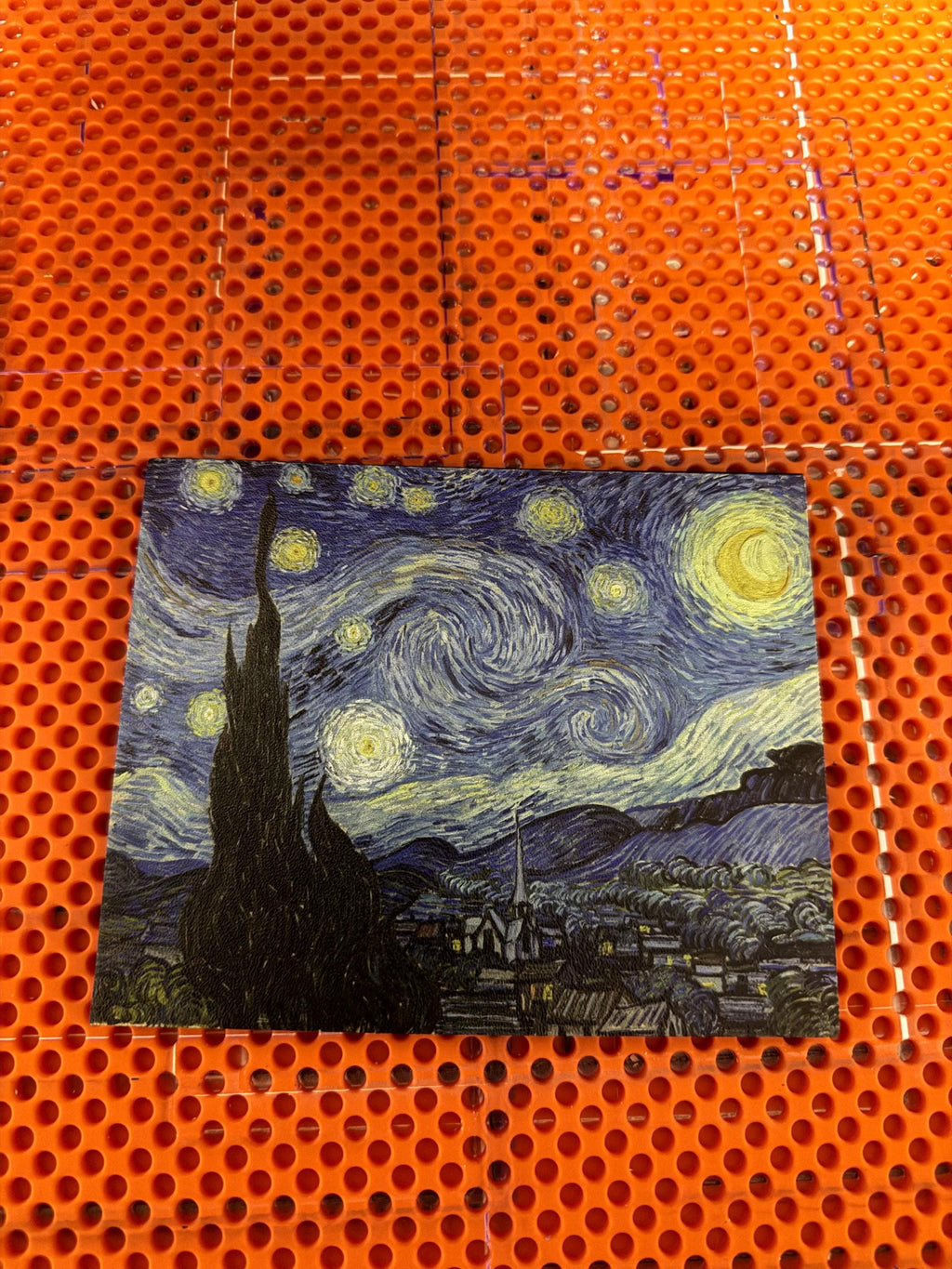 Starry Night Steam Machine Faceplate: Van Gogh Art UV Printed Magnetic Panel, uninstalled Starry Night faceplate panel lying on an orange perforated build plate