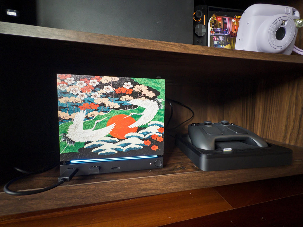 Custom Steam Machine Faceplate, Build your own Personalized Magnetic Cover Plate, Your Photo or Art UV Printed, Gamer Gift Valve Steam, Japanese crane, red sun and cherry blossom faceplate installed on the Steam Machine on a wooden shelf, with a Steam controller on its charging dock beside it and an instant camera on the shelf above