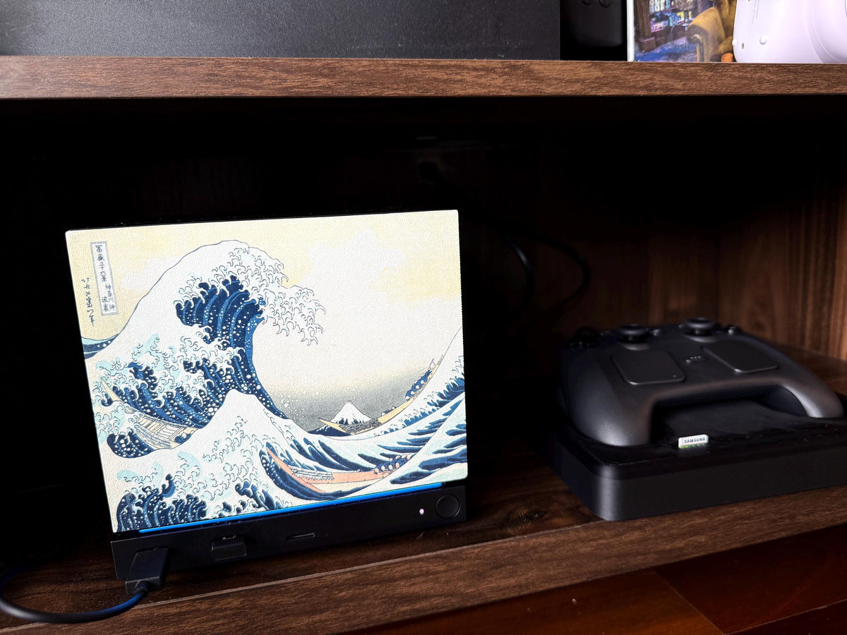 Hokusai Wave Steam Machine Faceplate, UV Printed Japanese Art Console Skin, Steam Machine with the Great Wave faceplate installed on a wooden shelf next to a Steam controller on its dock