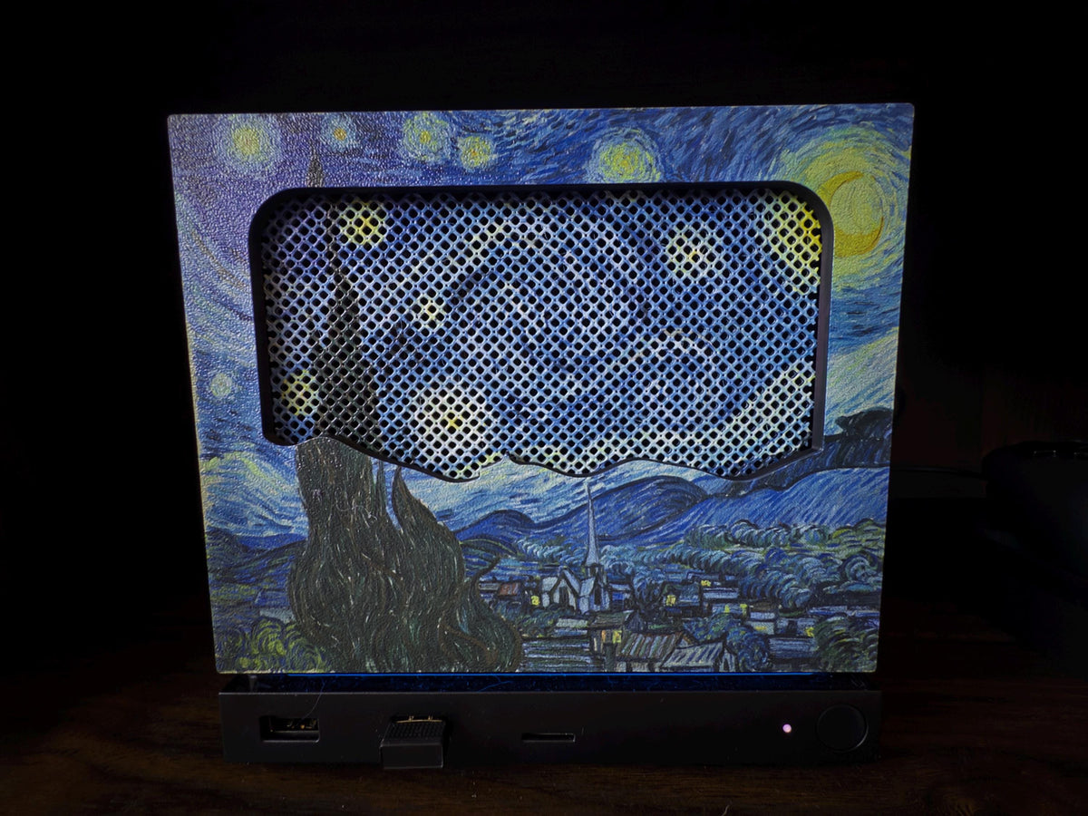 New Mesh!! Starry Night Steam Machine Faceplate Van Gogh Front Panel Fine Art UV Printed Magnetic Classic Painting Gamer Gift, straight-on front view showing the mesh airflow grille through the Starry Night print, installed on the console on a black stand against a dark background