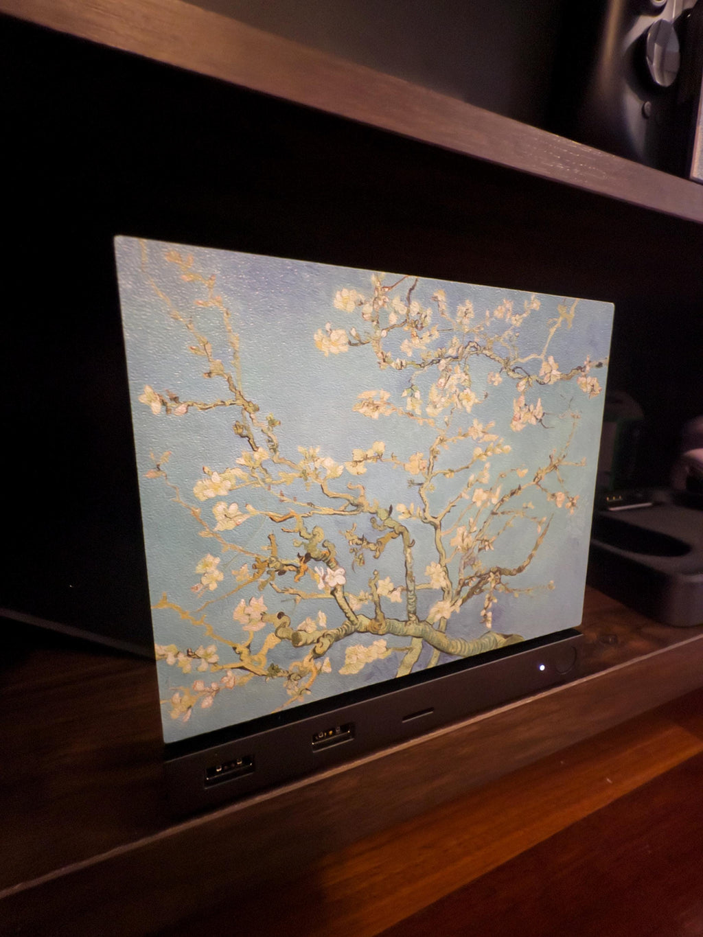 Van Gogh Almond Blossom Steam Machine Faceplate, Magnetic Art Cover Gaming Decor, angle view of the Steam Machine with the Almond Blossom faceplate installed on a dark wooden shelf with a soundbar below it