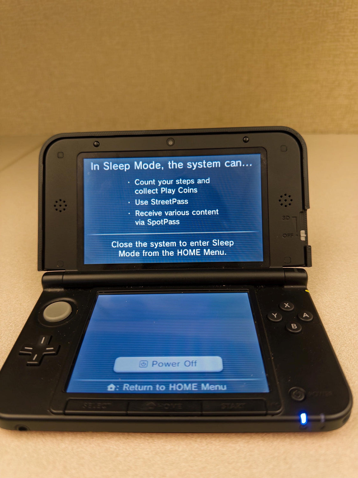 3DS XL Custom Lid, Full Color UV Printed Snap On Cover, Top Shell Faceplate for Original 3DS XL, Your Own Image, Interchangeable Lid, open black 3DS XL console with both screens turned on, showing the Sleep Mode menu on a beige tabletop