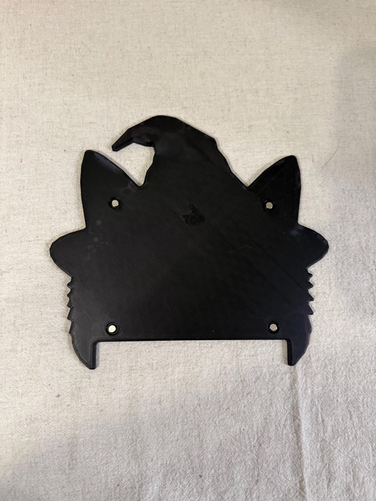 Steam Machine Faceplate Black Cat Witch Hat, Halloween Witchy Cat Magnetic Plate, UV Printed Console Cover, Spooky Gamer Gift, back view of the unprinted black witch cat faceplate showing its four magnets, on an off-white textured fabric background