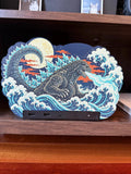 Steam Machine Faceplate, Custom Faceplate, Godzilla Kaiju Plate XL Oversized, Magnetic Console Cover, Monster Gamer Gift, Japan Wave Decor, Godzilla kaiju XL faceplate with a giant kaiju rising out of Japanese woodblock waves under a full moon, shown installed on the console on a wooden shelf, with the front USB ports and power button visible below the panel