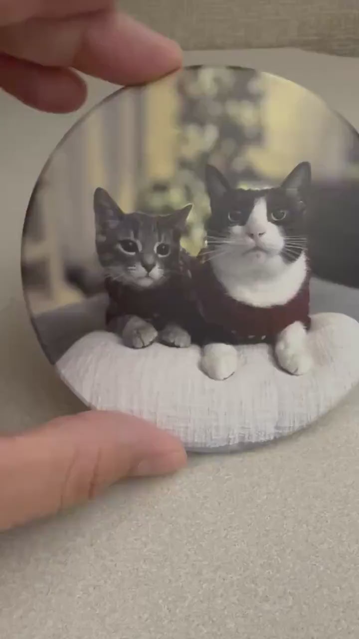 Custom Cat Photo Coaster: UV Printed Ceramic Tile (4x4) – Pet Memorial Keepsake, video of a hand holding and tilting the round coaster with the two-cats photo to show its glossy printed surface