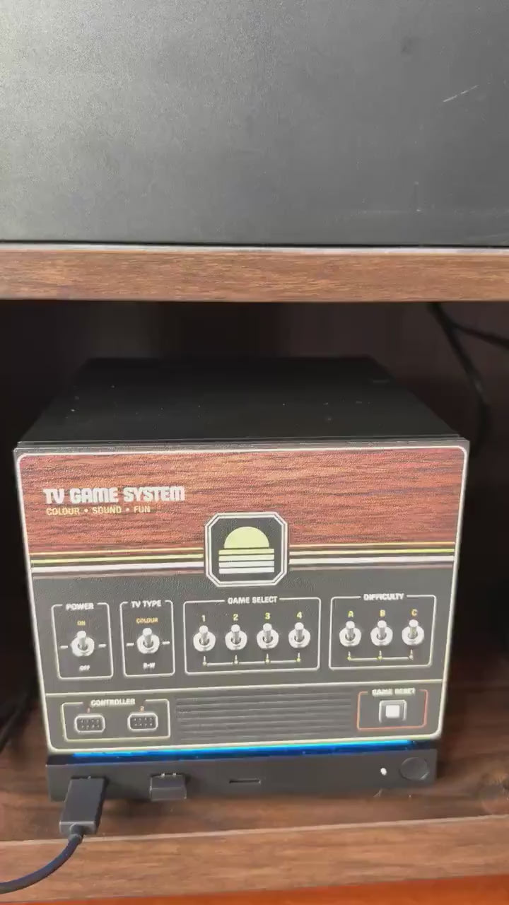 Retro Woodgrain Steam Machine Faceplate – 70s Atari Inspired Console Cover, video showing the Steam Machine with the retro woodgrain faceplate installed on a wooden shelf