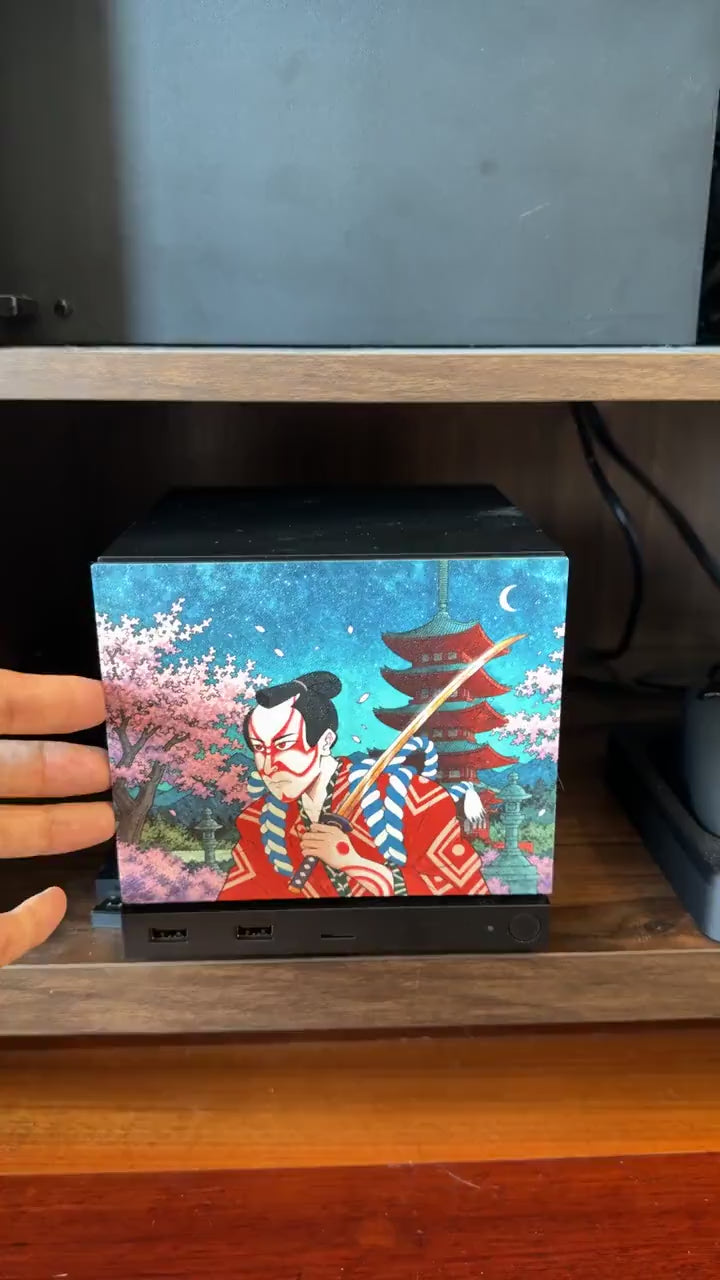 Koi Art Steam Machine Faceplate | Dark Teal Japanese Fish Panel | Magnetic UV Printed Cover | Zen Gamer Gift, video showing hands snapping the faceplate onto the console on a wooden shelf, demonstrating the magnetic fit