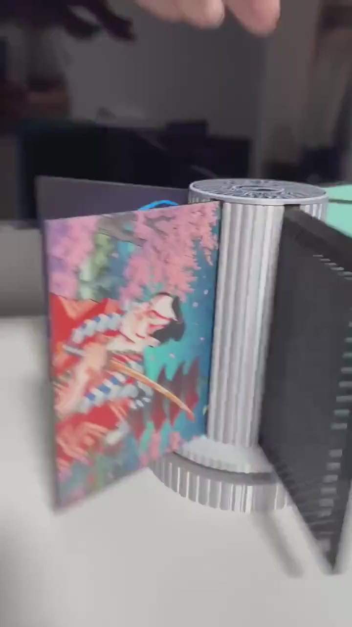 Steam Machine Faceplate Organizer, Spinning 3D Printed Display Stand, Rotating Plate Holder, Gamer Desk Setup, Gift for Gamer, Holds 6, 15 second video of the silk silver organizer spinning on a white desk with its six arms fanned out holding faceplates showing anime and cherry blossom artwork